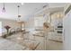 Gourmet kitchen boasts granite countertops, custom cabinetry, modern appliances, and ample storage space for culinary enthusiasts at 3871 Dallas Blvd, Orlando, FL 32833