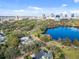 Aerial view showcasing a lake, cityscape, and neighborhood at 450 Cherokee Dr, Orlando, FL 32801