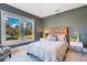 Bedroom with a leather headboard and view of a park at 450 Cherokee Dr, Orlando, FL 32801