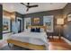 Spacious main bedroom featuring a large bed and hardwood floors at 450 Cherokee Dr, Orlando, FL 32801