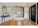 Bright and spacious entryway with hardwood floors and a staircase at 450 Cherokee Dr, Orlando, FL 32801