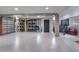 Garage space featuring epoxy floor, storage, and access door to the house at 450 Cherokee Dr, Orlando, FL 32801