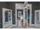 Bright hallway with mirrored closet doors and hardwood floors at 450 Cherokee Dr, Orlando, FL 32801