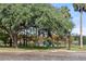 View of Lake Cherokee Park with a brick pathway at 450 Cherokee Dr, Orlando, FL 32801