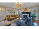 Beautifully decorated living room with fireplace, natural light, and comfortable seating at 450 Cherokee Dr, Orlando, FL 32801