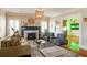 Spacious living room featuring a fireplace and comfortable seating at 450 Cherokee Dr, Orlando, FL 32801