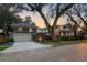 Evening street view of charming homes and brick-paved street at 450 Cherokee Dr, Orlando, FL 32801