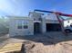 Image of a single-story home construction showcasing cinder block walls and garage with open entry at 5268 Prairie Preserve Run, St Cloud, FL 34772