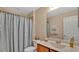 Clean bathroom with a shower/tub combo and updated vanity at 564 Woodland Terrace Blvd, Orlando, FL 32828