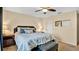 Bright bedroom with a king-size bed and ample closet space at 564 Woodland Terrace Blvd, Orlando, FL 32828
