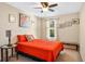 Charming bedroom with a full-size bed and plenty of natural light at 564 Woodland Terrace Blvd, Orlando, FL 32828