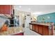 Modern kitchen with granite countertops and stainless steel appliances at 564 Woodland Terrace Blvd, Orlando, FL 32828