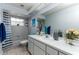 Bathroom featuring a shower-tub combo, a sink, and a vanity area at 731 Red Coach Ave, Deltona, FL 32725