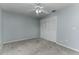 Relaxing bedroom with carpeting, a fan, closet, and plenty of natural light at 731 Red Coach Ave, Deltona, FL 32725
