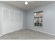 Comfortable bedroom with carpeting, a window, and closet at 731 Red Coach Ave, Deltona, FL 32725