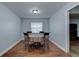 Cozy dining room featuring wood floors, a central light, and a table for memorable meals at 731 Red Coach Ave, Deltona, FL 32725