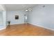 Bright living room with high ceilings and laminate flooring at 731 Red Coach Ave, Deltona, FL 32725