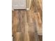 Light brown wood-look floor in hallway at 1223 Arbor Lakes Cir, Sanford, FL 32771