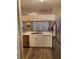 Kitchen with double sink and white cabinets at 1223 Arbor Lakes Cir, Sanford, FL 32771
