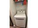 Neatly organized laundry closet with washer and dryer at 1223 Arbor Lakes Cir, Sanford, FL 32771