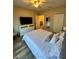 Main bedroom with large bed and dresser at 1223 Arbor Lakes Cir, Sanford, FL 32771