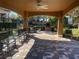 Covered patio area with seating and grills at 1223 Arbor Lakes Cir, Sanford, FL 32771