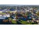 Aerial view of the property outlined in red, showcasing proximity to a lake, commercial area, and main street at 1235 19Th St, Orlando, FL 32805