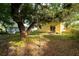 Secluded backyard featuring mature trees providing plenty of shade and a charming, peaceful environment at 1235 19Th St, Orlando, FL 32805