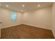 Bedroom featuring wood-look floors, recessed lighting, and a window at 1235 19Th St, Orlando, FL 32805