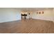 Large living area with hardwood floors, recessed lighting, and access to the kitchen at 1235 19Th St, Orlando, FL 32805