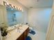 Clean bathroom with vanity, toilet, and bathtub at 1236 N Fairway Dr, Apopka, FL 32712