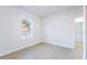 Bright bedroom features hardwood floors and a window bringing in plenty of natural light at 14962 Sw 39Th Cir, Ocala, FL 34473