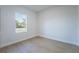Bright bedroom features hardwood floors and a window bringing in plenty of natural light at 14962 Sw 39Th Cir, Ocala, FL 34473