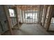 Interior framing of a garage with a view into the garage from inside the home at 14962 Sw 39Th Cir, Ocala, FL 34473