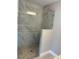 Modern bathroom boasts a stylish glass shower with beautiful tile work and neutral-toned walls at 1621 Pear Ave, Sanford, FL 32771
