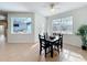 Bright breakfast nook features a table with four chairs, and a view into the Gathering room at 20402 Sheldon St, Orlando, FL 32833