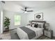 Spacious bedroom with a comfortable bed and stylish decor at 22474 Sw Rainbow Lakes Blvd, Dunnellon, FL 34431
