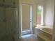 Bathroom includes a shower, bathtub, and exterior access at 237 S Shadowbay Blvd, Longwood, FL 32779