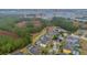 Aerial view of community with houses and pools at 256 Yellow Snapdragon Dr, Davenport, FL 33837
