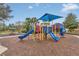 Colorful playground with slides and climbing structures at 256 Yellow Snapdragon Dr, Davenport, FL 33837