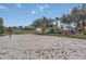 Community sand volleyball court and playground at 256 Yellow Snapdragon Dr, Davenport, FL 33837