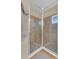 Walk-in shower with tile surround at 256 Yellow Snapdragon Dr, Davenport, FL 33837
