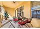 Private patio with seating for four and lake views at 4804 Cayview Ave # 106, Orlando, FL 32819