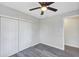 Bedroom with double door closet and vinyl plank flooring at 805 Willow Ave, Sanford, FL 32771