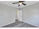 Bright bedroom with ceiling fan and grey vinyl plank flooring at 805 Willow Ave, Sanford, FL 32771