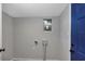 Laundry room with vinyl flooring and a window at 805 Willow Ave, Sanford, FL 32771