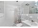 Bathroom with white tile and shower/tub combo at 811 Briercliff Dr, Orlando, FL 32806