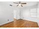 Bright bedroom with hardwood floors and ceiling fan at 811 Briercliff Dr, Orlando, FL 32806