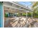 Covered carport provides parking and shade at 811 Briercliff Dr, Orlando, FL 32806