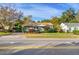 Light green house exterior with lawn and driveway at 811 Briercliff Dr, Orlando, FL 32806